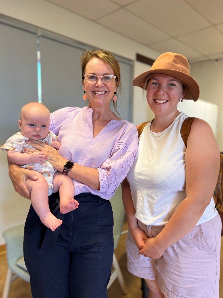 Two ladies with a baby